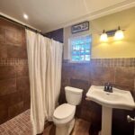Bathroom off of Kitchen & Laundry Room