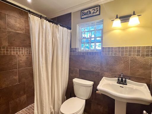 Bathroom off of Kitchen & Laundry Room