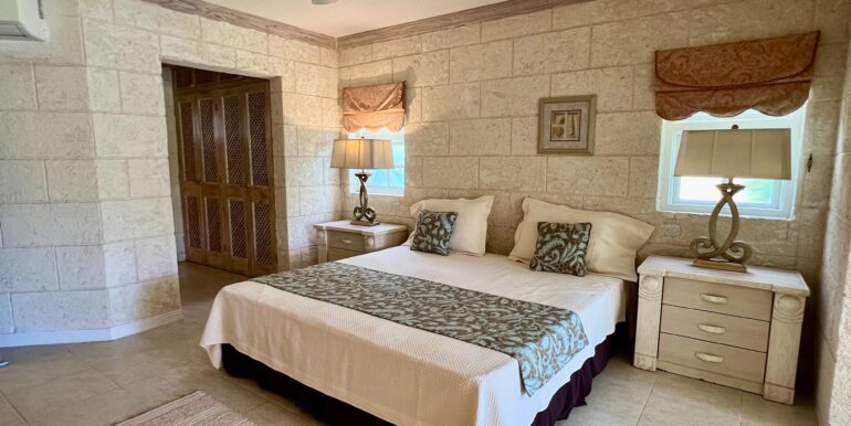 Royal Westmoreland Forest Hills 6 master bedroom bed and bathroom view
